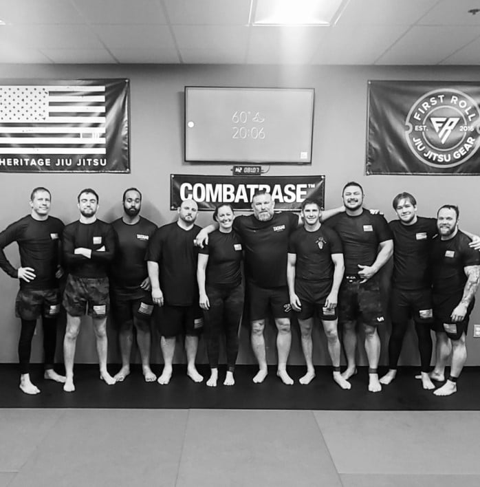 A group of Heritage Jiu Jitsu teammates lined up together after training
